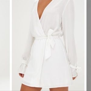 Pretty little things wrap white dress. NWT size 6